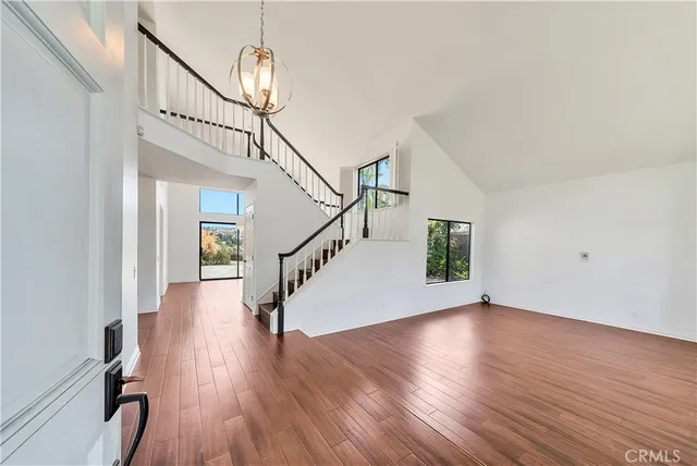 a view of entryway with wooden floor