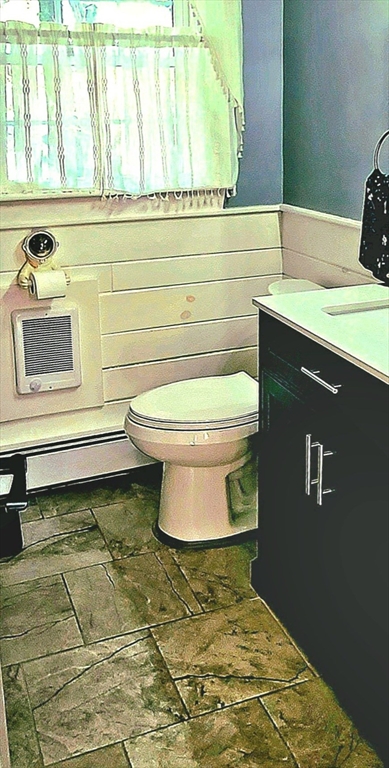 49 Anderson Avenue Middleboro, MA 02346 - Photo 15 of 25 a bathroom with a toilet sink and mirror