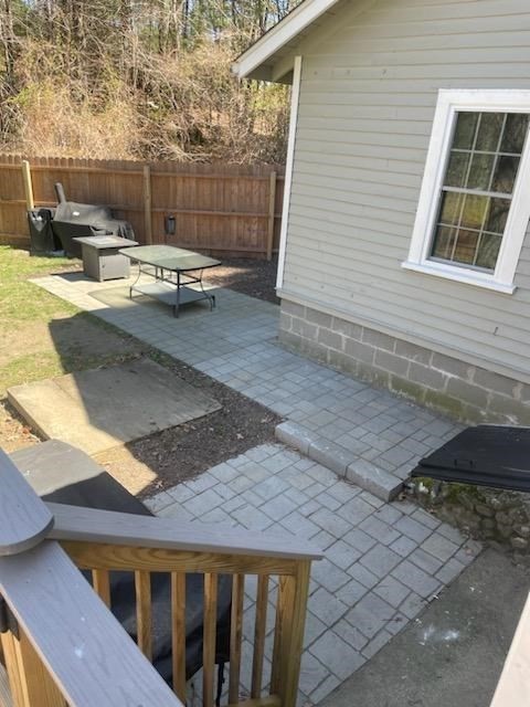 49 Anderson Avenue Middleboro, MA 02346 - Photo 24 of 25 a backyard of a house with outdoor seating