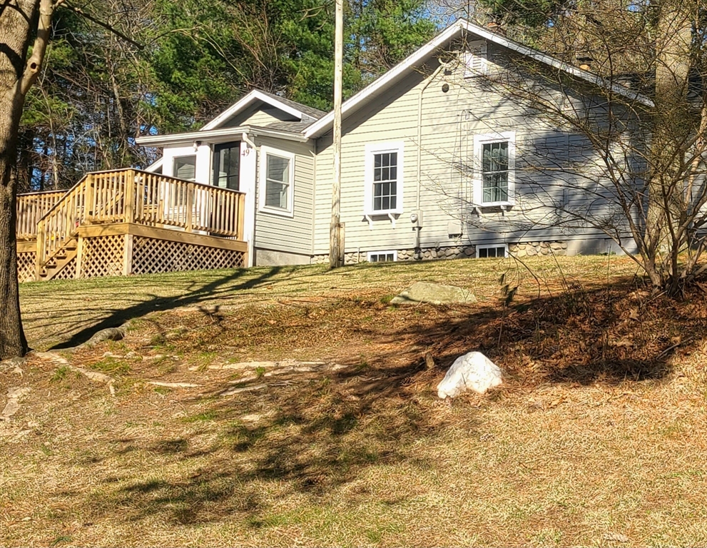 49 Anderson Avenue Middleboro, MA 02346 - Photo 4 of 25 a front view of a house with a yard