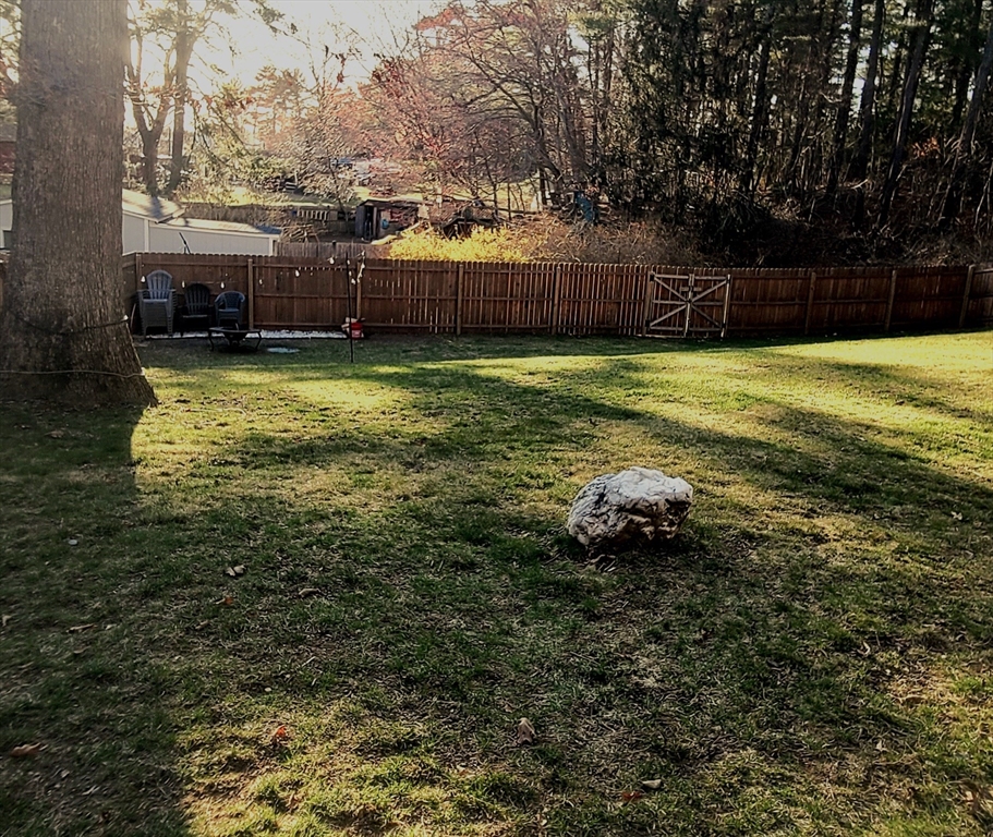 49 Anderson Avenue Middleboro, MA 02346 - Photo 5 of 25 a view of a pool with lawn chairs yard