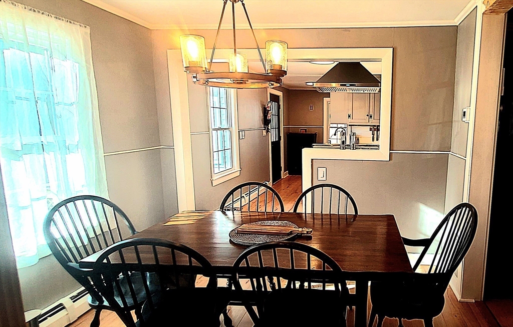 49 Anderson Avenue Middleboro, MA 02346 - Photo 10 of 25 a view of a dining room with furniture and chandelier