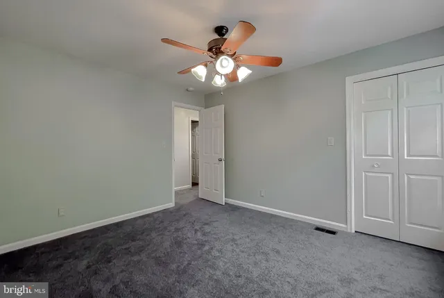 a bathroom with a sink and a large mirror