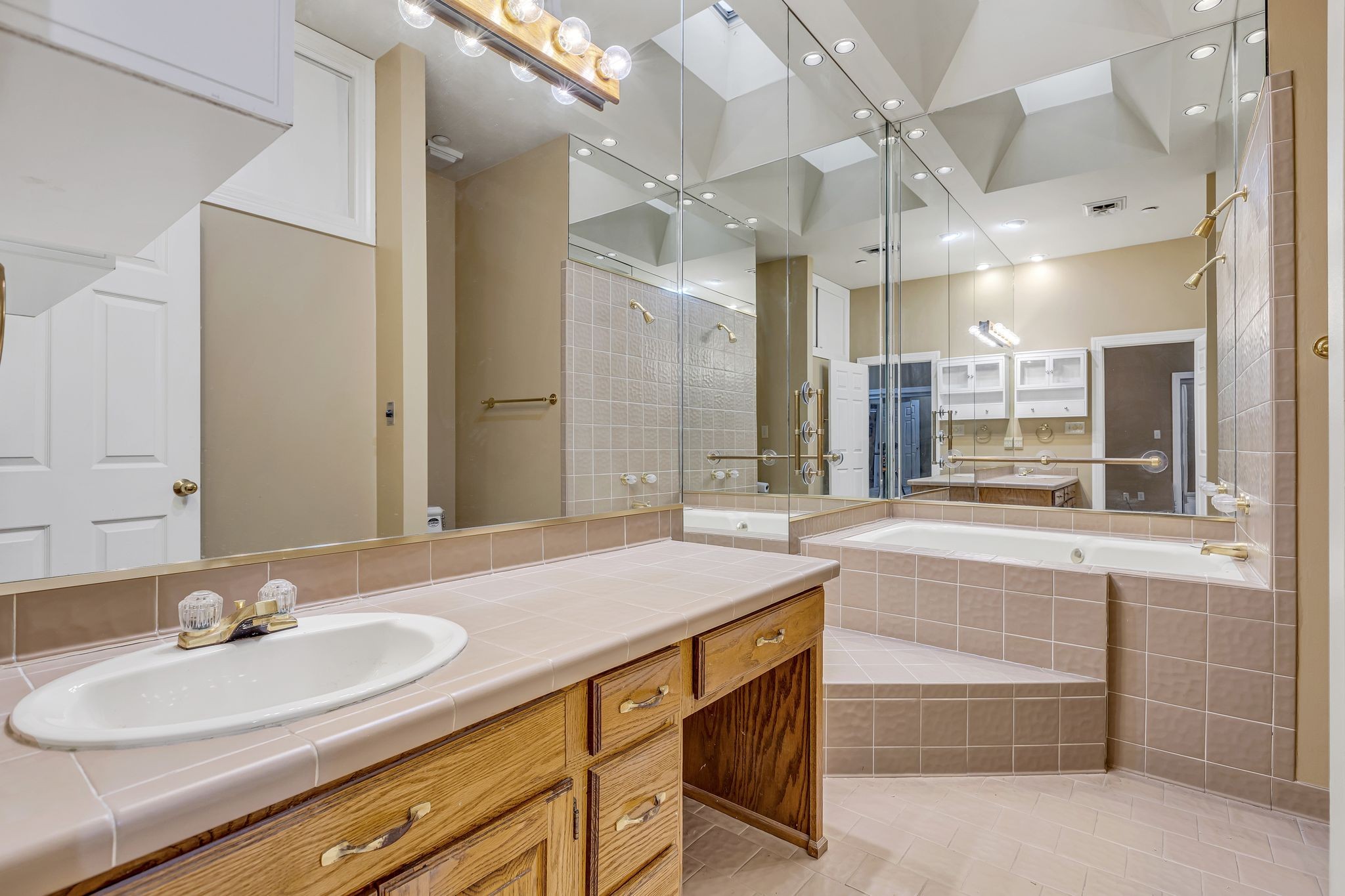 424 Main Street, Unit B Franklin, TN 37064 - Photo 11 of 14 a bathroom with a sink double vanity and a mirror