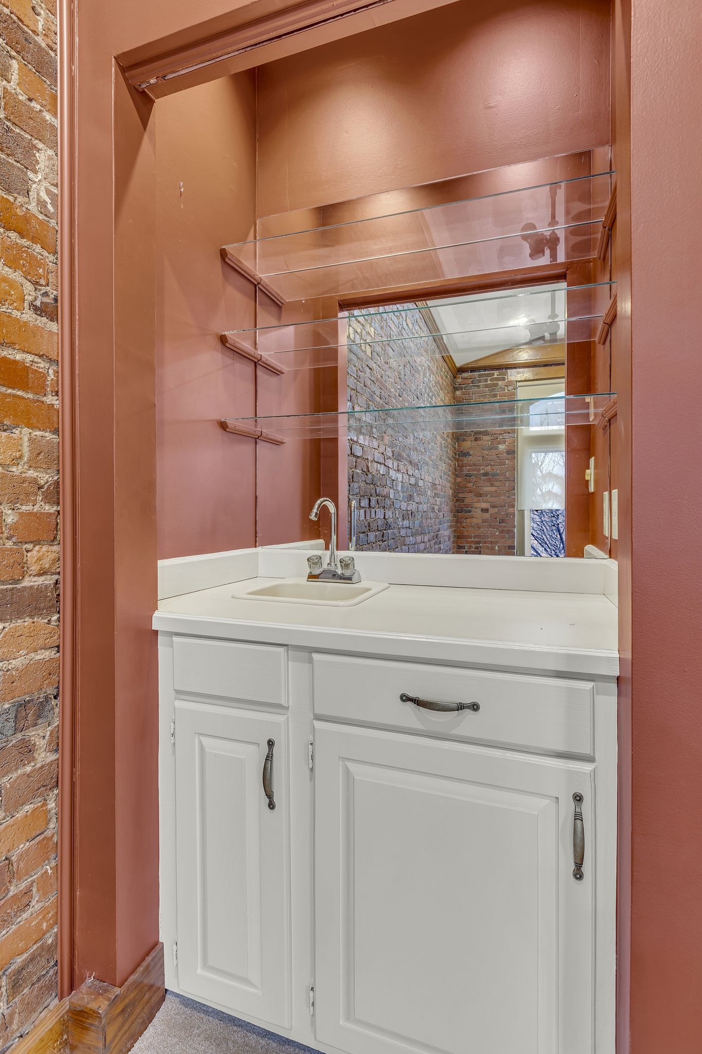 424 Main Street, Unit B Franklin, TN 37064 - Photo 5 of 14 a bathroom with a sink and a mirror