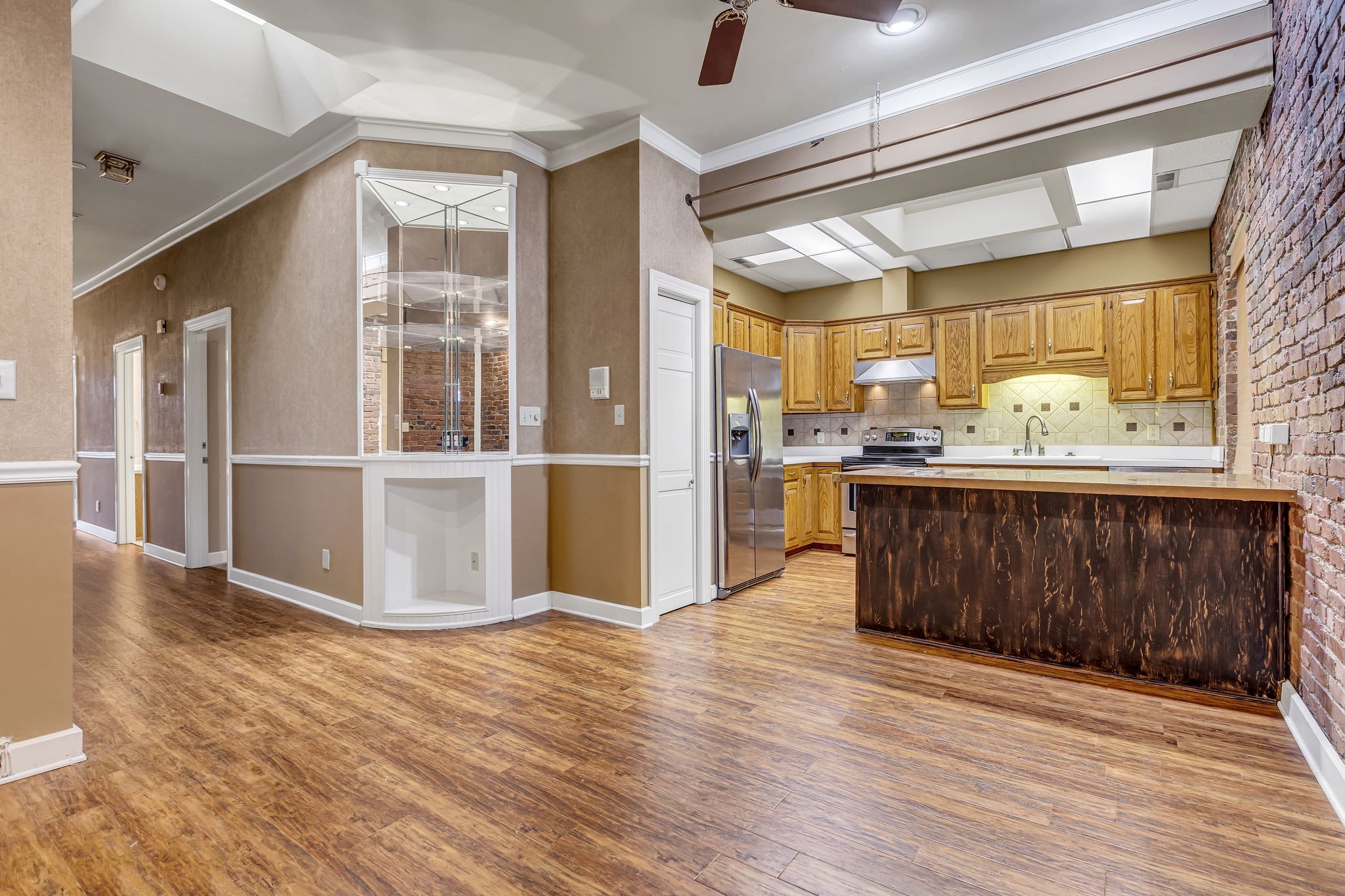 424 Main Street, Unit B Franklin, TN 37064 - Photo 7 of 14 a room with wooden floors and furniture