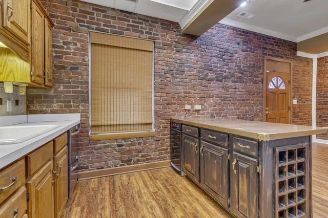 a bathroom with a sink and a shower