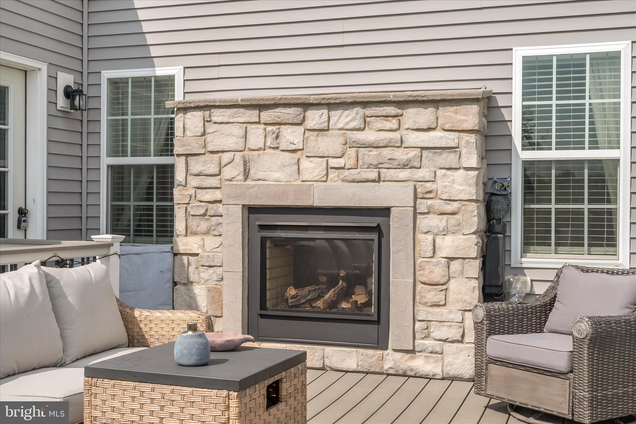 1388 Rocky Springs Road Frederick, MD 21702 - Photo 65 of 97 a living room with furniture a window and a fireplace
