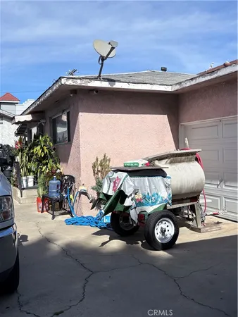 a car parked in garage with a mirror