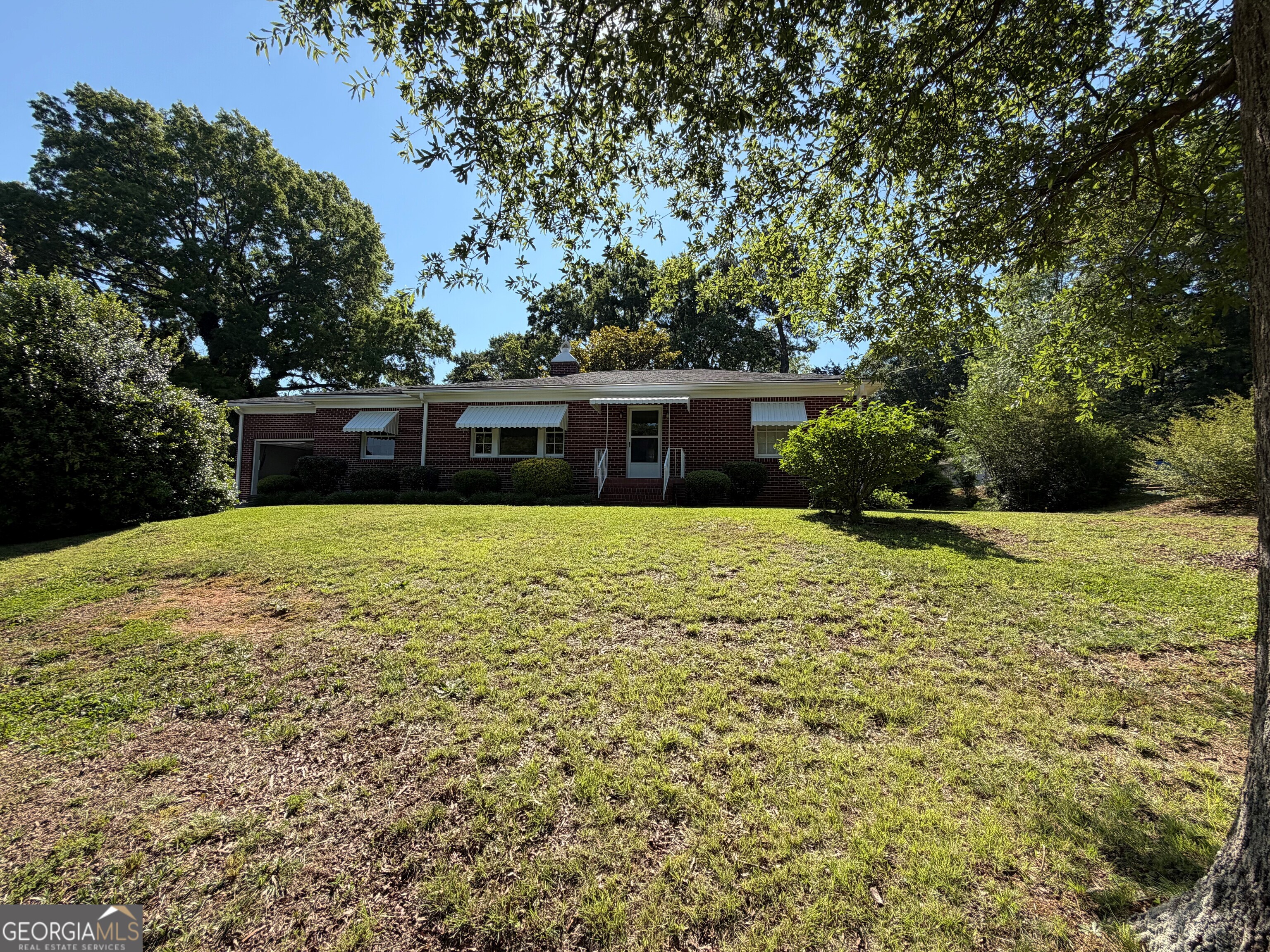 2619 Maple Road Southeast Rome, GA 30161 - Photo 3 of 31 a view of a house with a yard
