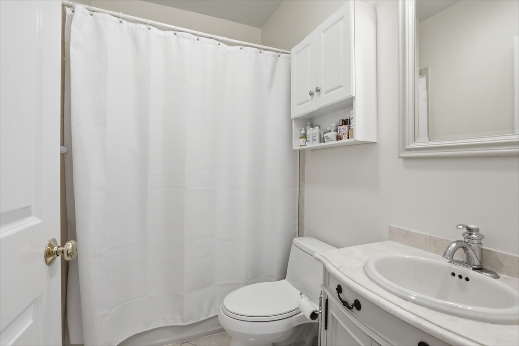 73 Myrtle Street, Unit 2 Boston, MA 02114 - Photo 13 of 13 a bathroom with a sink and a toilet