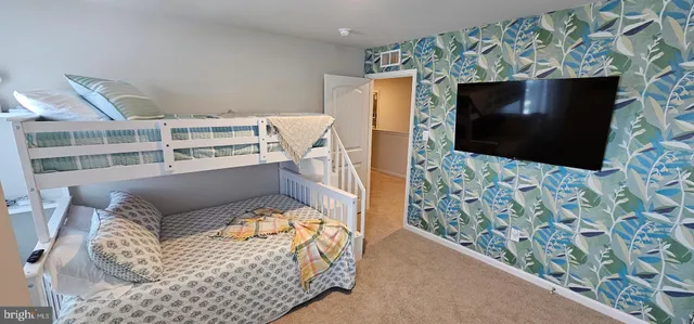 a bathroom with a sink mirror vanity and toilet