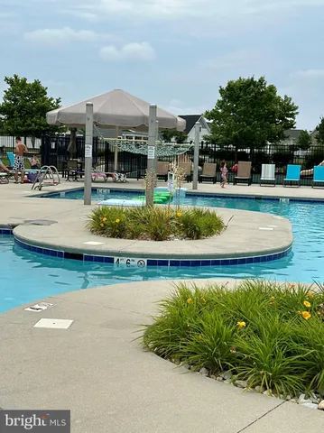 a view of a tables and chairs in patio
