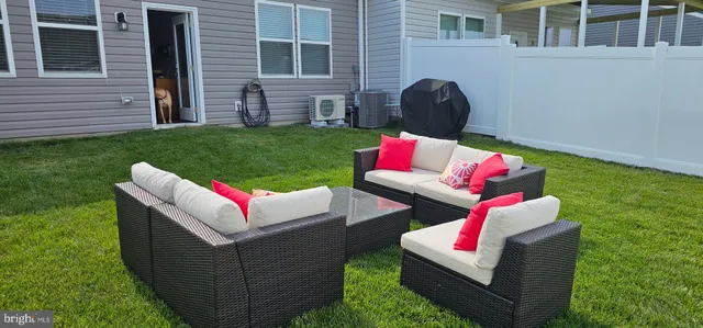 a view of a brick house with many windows