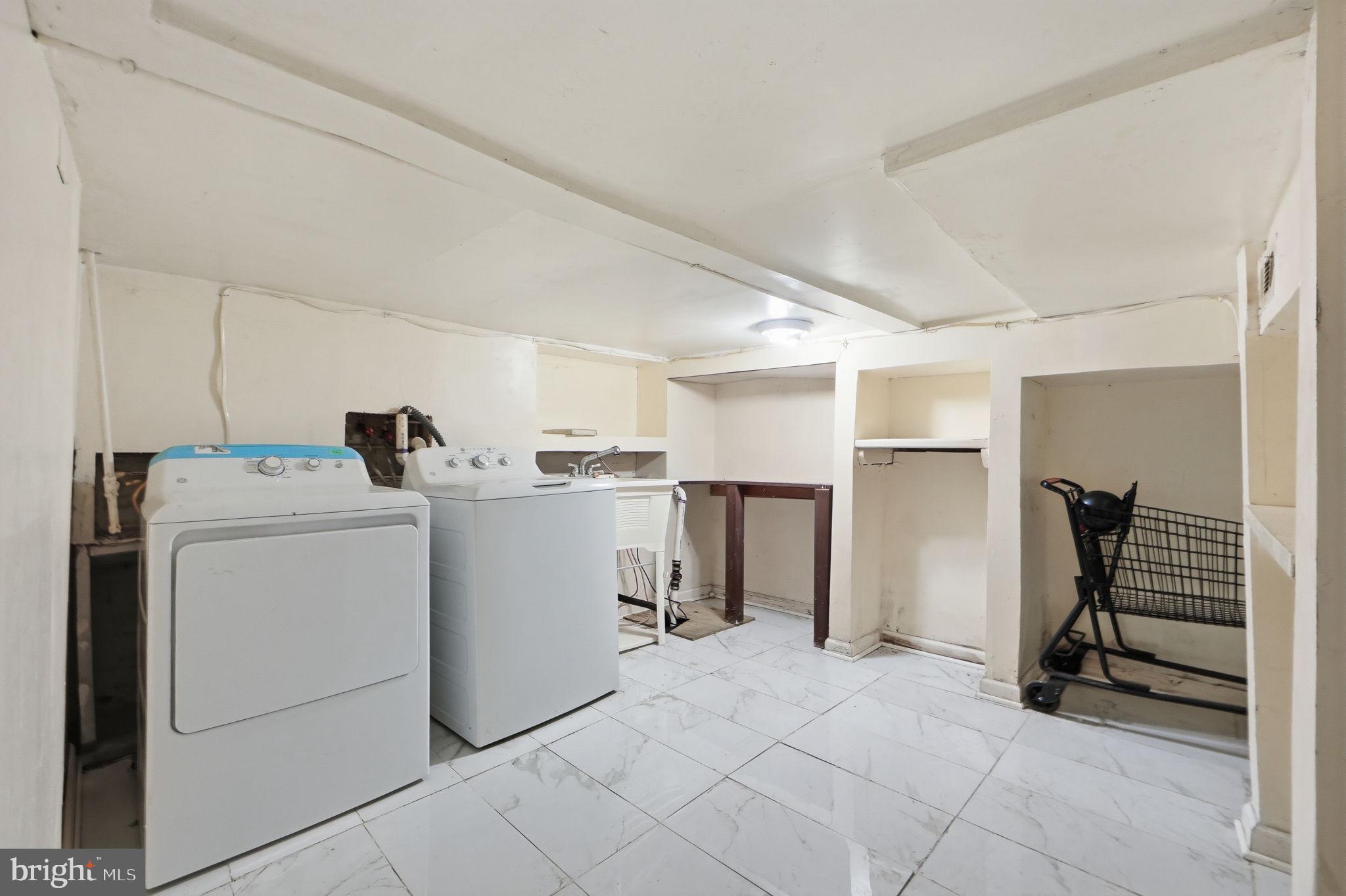 3449 Old Frederick Road Baltimore, MD 21229 - Photo 19 of 25 Bright and functional laundry space.
