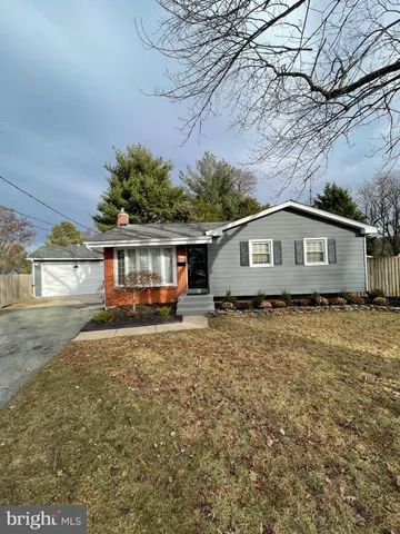 a view of house with outdoor space