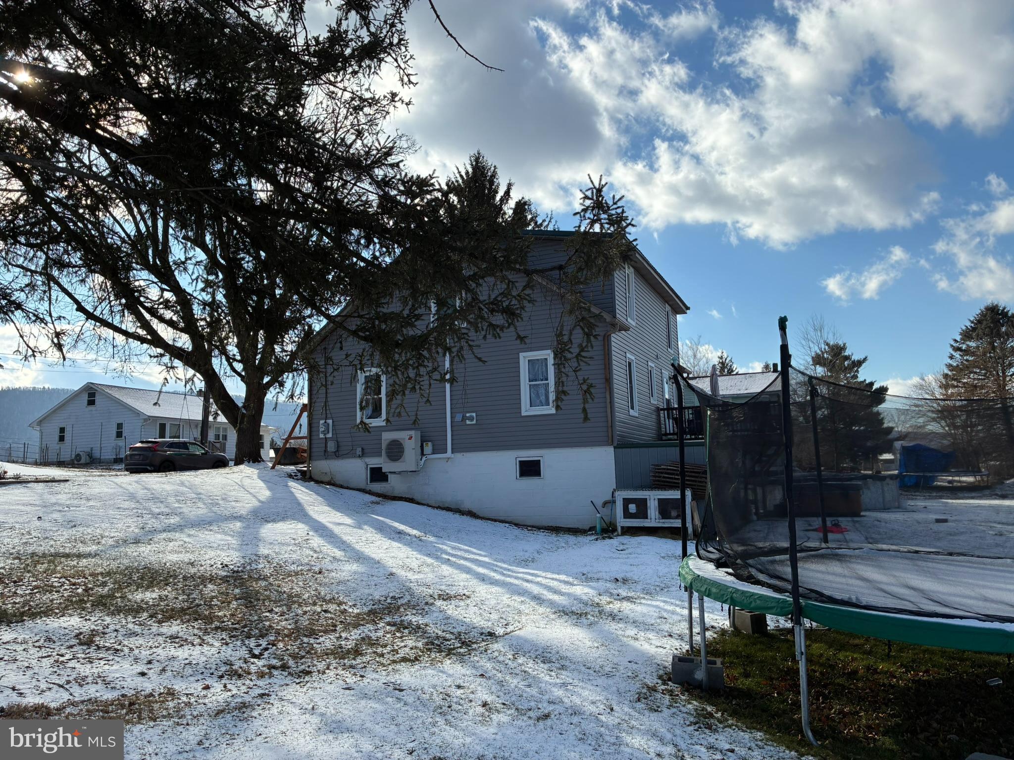 421 James Street Lock Haven, PA 17745 - Photo 34 of 34 Charming home nestled in a winter landscape.