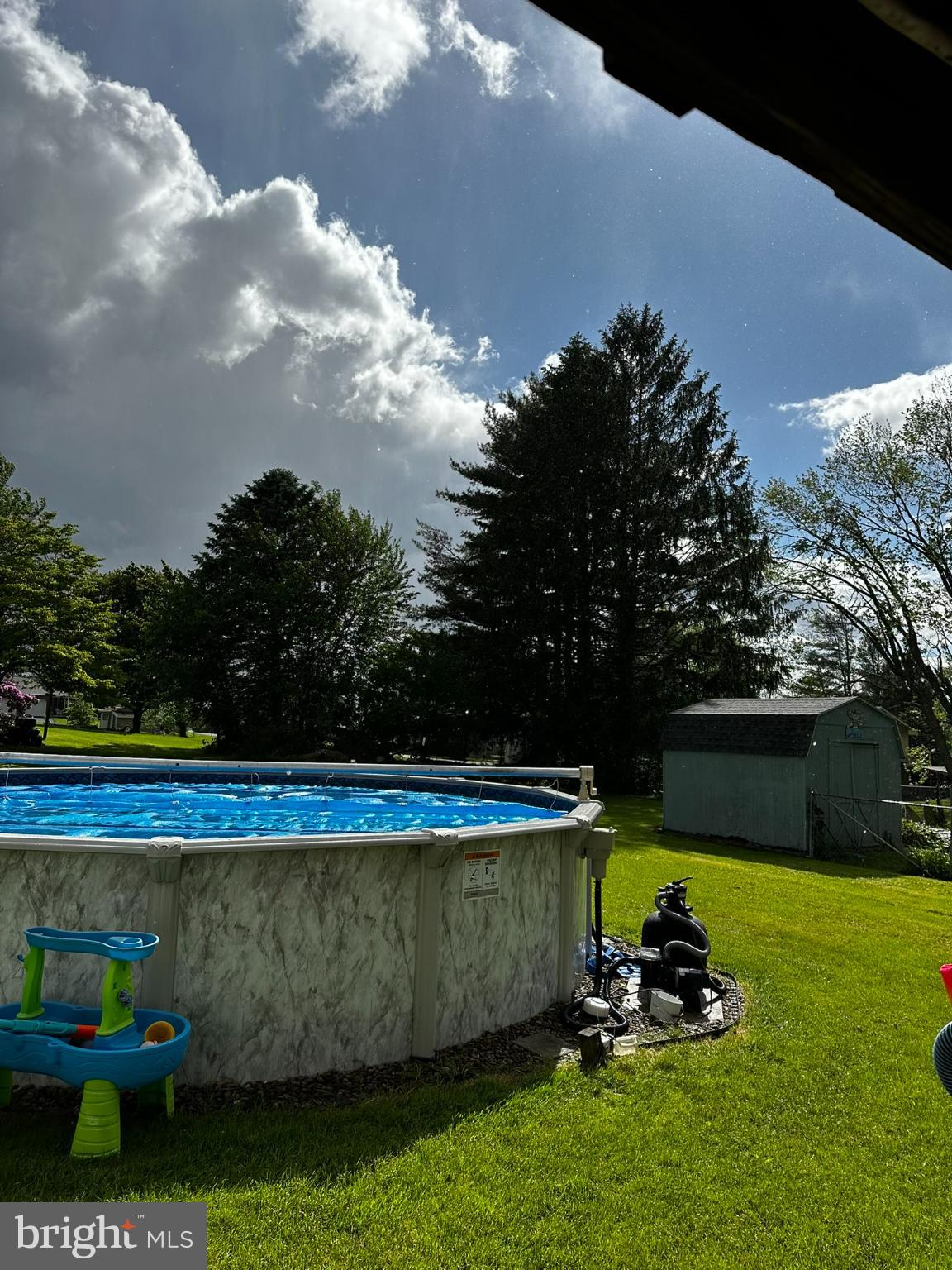 421 James Street Lock Haven, PA 17745 - Photo 35 of 39 Sunny backyard oasis with a pool retreat.