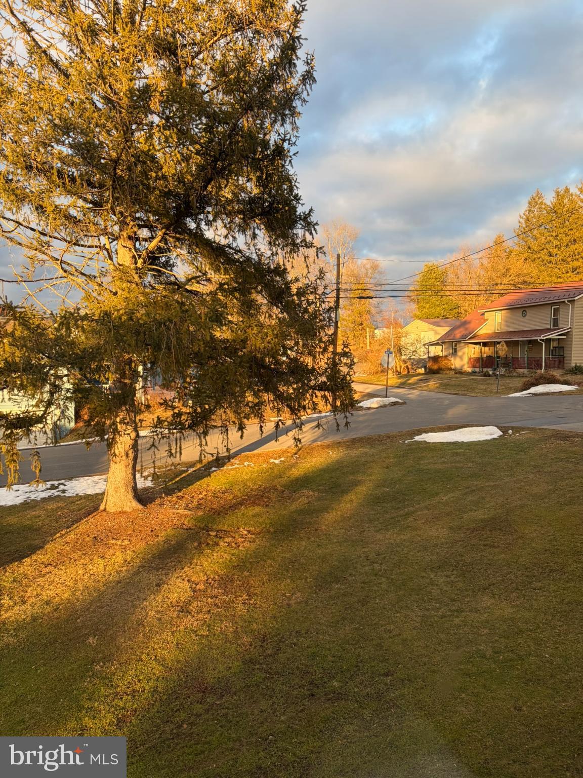 421 James Street Lock Haven, PA 17745 - Photo 37 of 39 Golden hour light on a tranquil neighborhood.