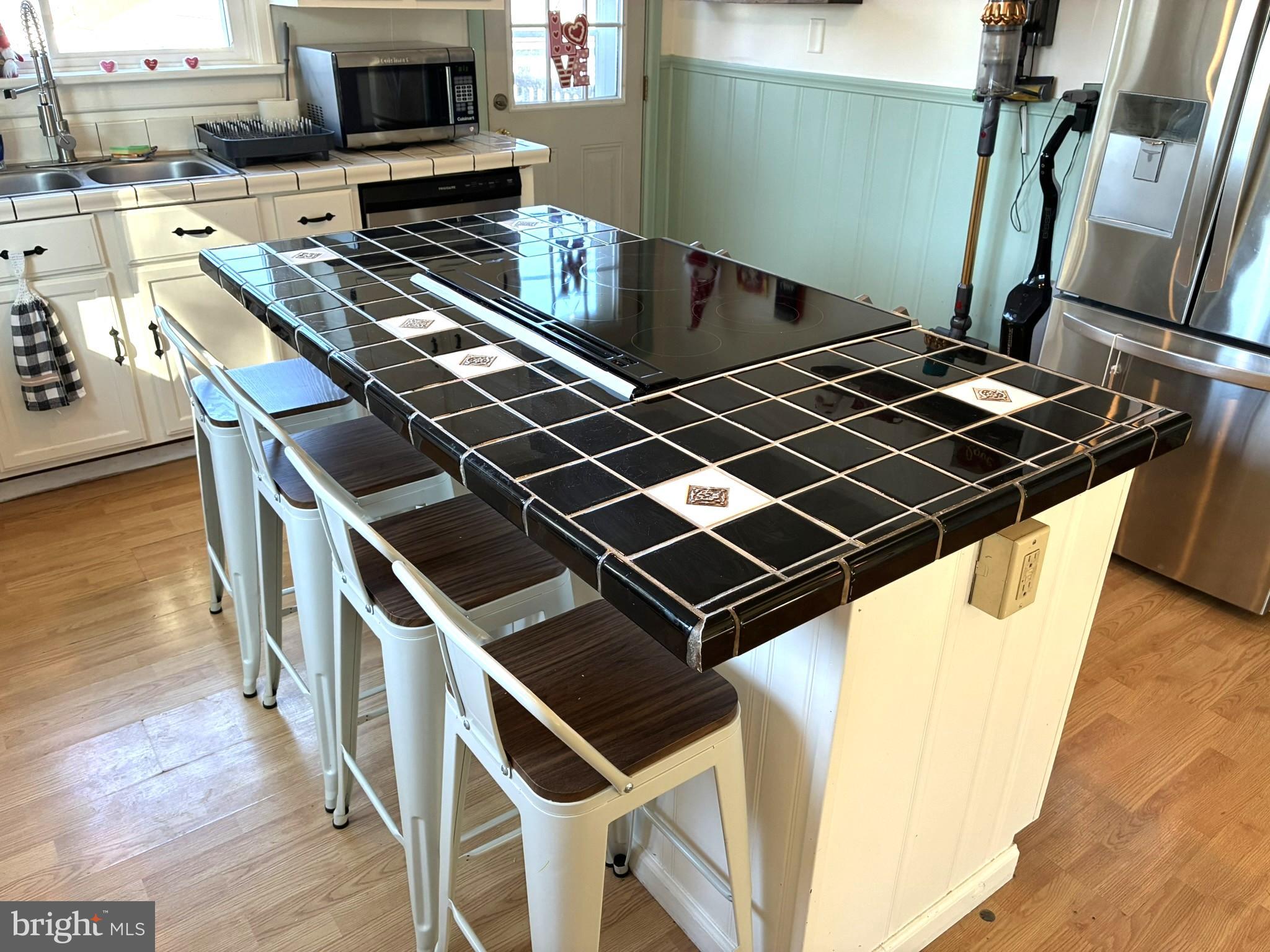 421 James Street Lock Haven, PA 17745 - Photo 8 of 34 Sleek kitchen island with modern flair.