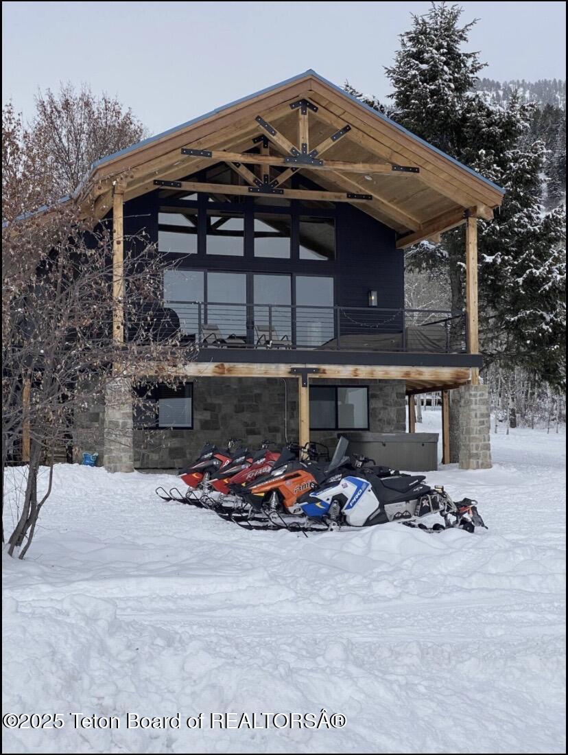 121 Canyon Pines Way Star Valley Ranch, WY 83127 - Photo 32 of 36 121 Canyon Pines in winter