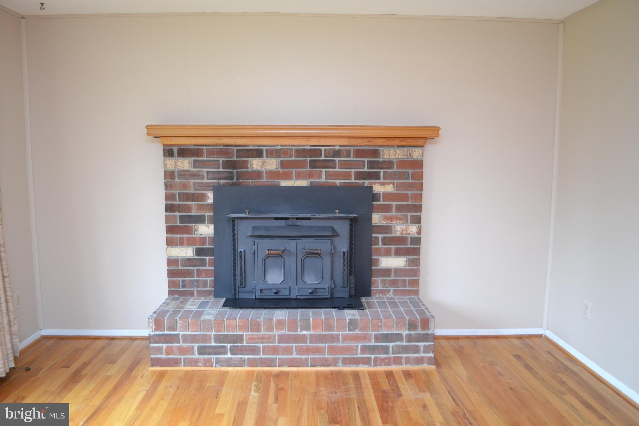3673 Ridgeview Road Ijamsville, MD 21754 - Photo 3 of 26 Wood stove conveys!