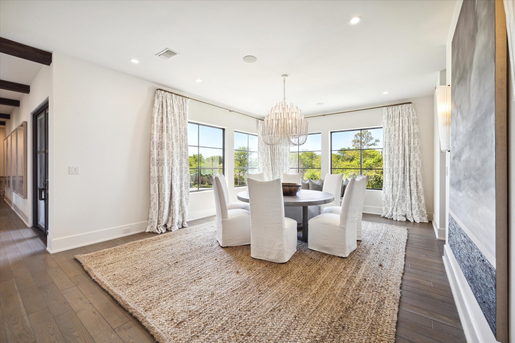 633 Quintana Roo Place Seabrook, TX 77586 - Photo 15 of 47 The beautiful formal dining room is connected to the kitchen and wet bar. It is filled with light and offers sweeping vistas!