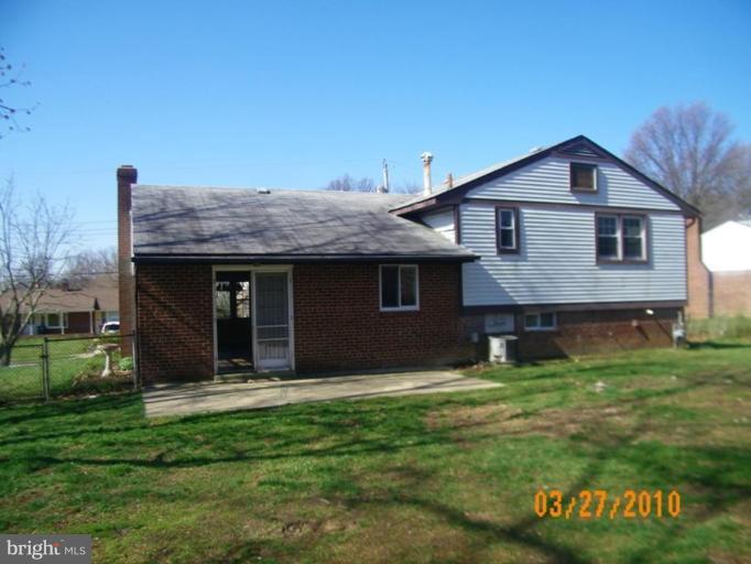 5211 Dalton Road Springfield, VA 22151 - Photo 3 of 14 a view of a house with a yard