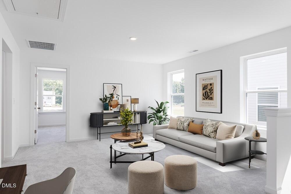 239 Blue Butterfly Drive Angier, NC 27501 - Photo 8 of 41 a living room with furniture and a window
