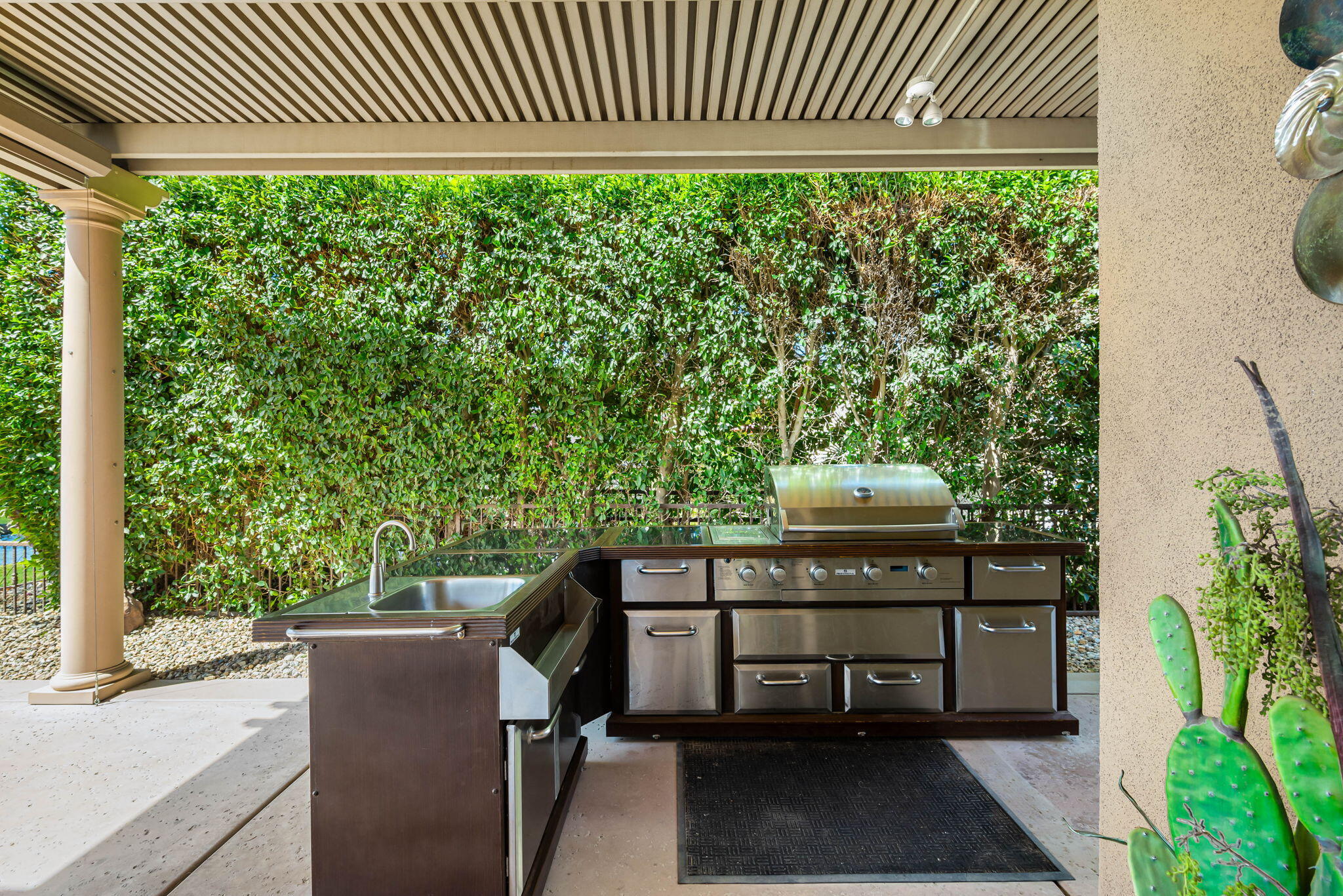 48170 Hjorth Street, Unit 74 Indio, CA 92201 - Photo 11 of 37 a view of a two chairs in the patio