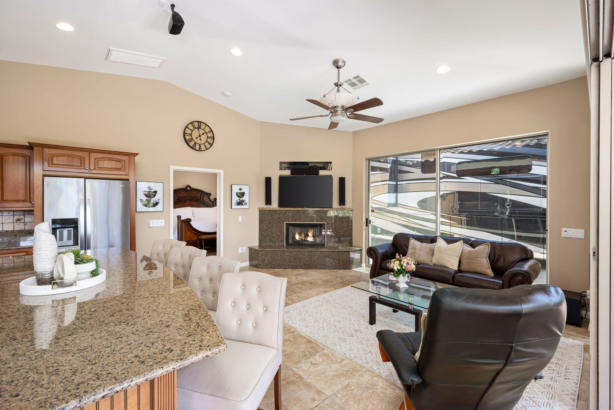 48170 Hjorth Street, Unit 74 Indio, CA 92201 - Photo 23 of 37 a living room with furniture and a flat screen tv