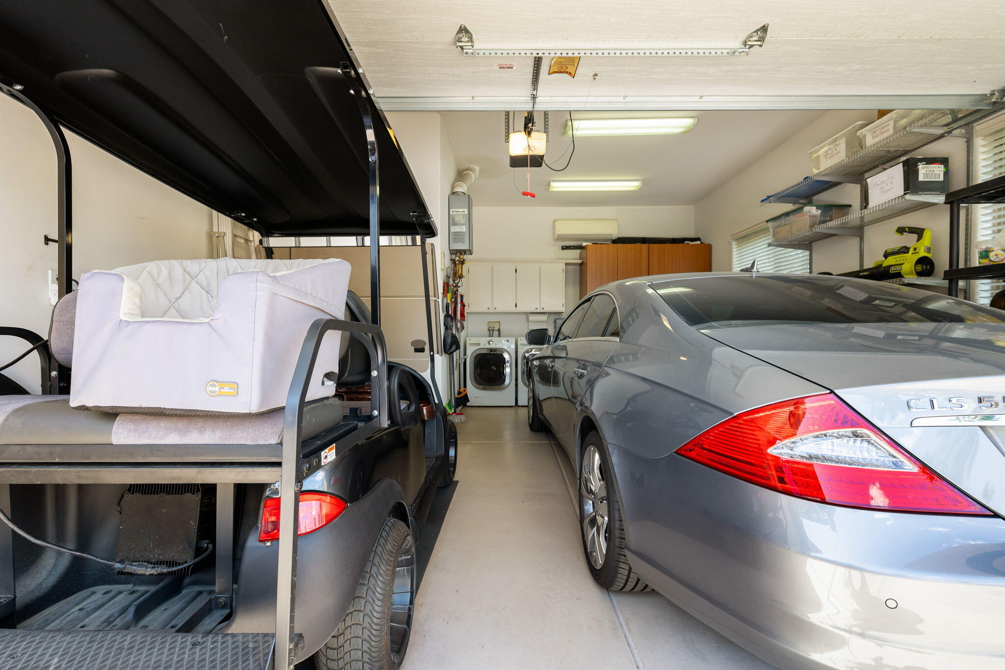 48170 Hjorth Street, Unit 74 Indio, CA 92201 - Photo 37 of 37 a living room with furniture gym equipment and a fireplace