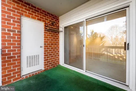 a bathroom with a sink vanity and a mirror