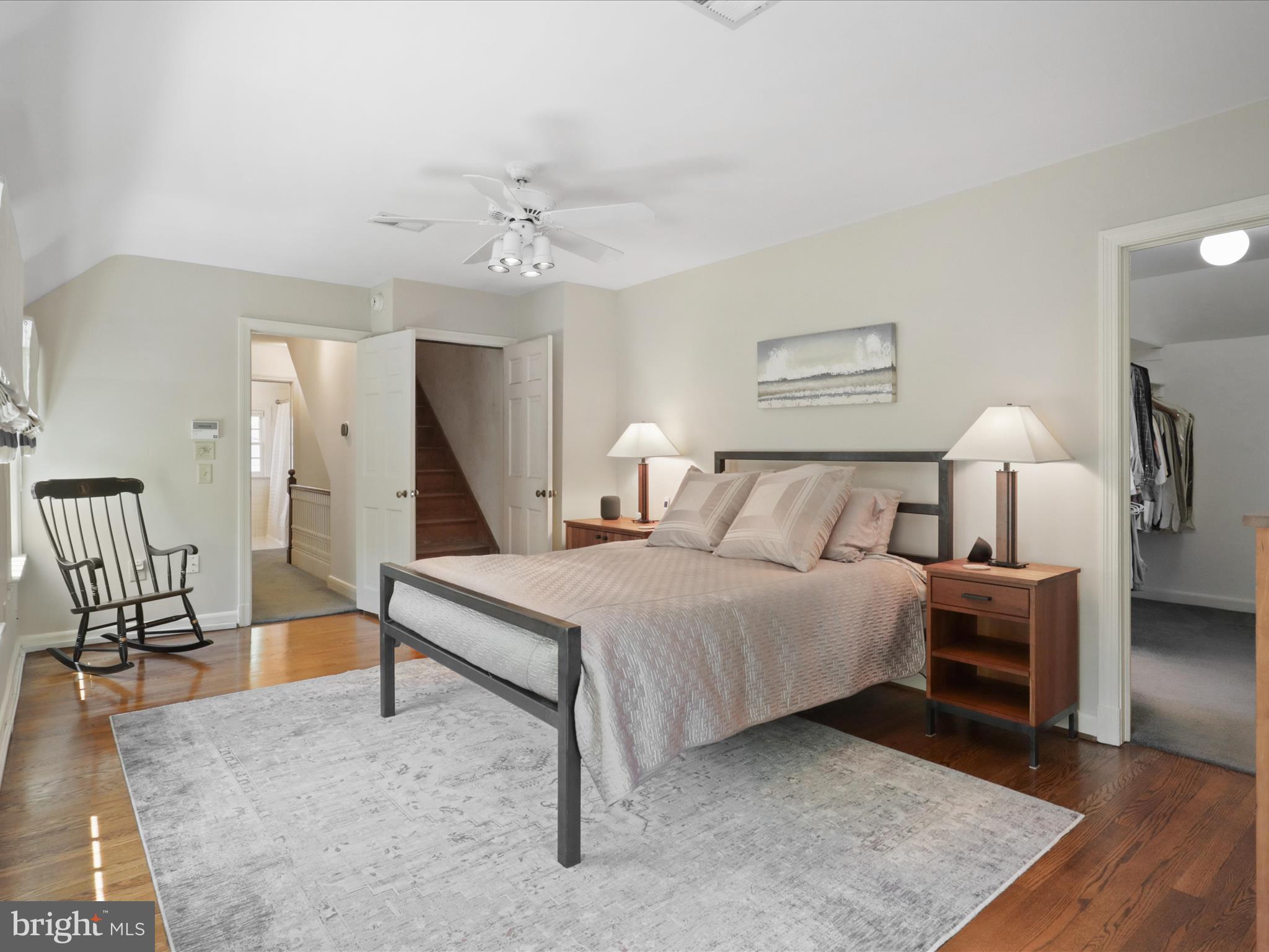 4725 Rock Spring Road Arlington, VA 22207 - Photo 26 of 59 a spacious bedroom with a bed and wooden floor