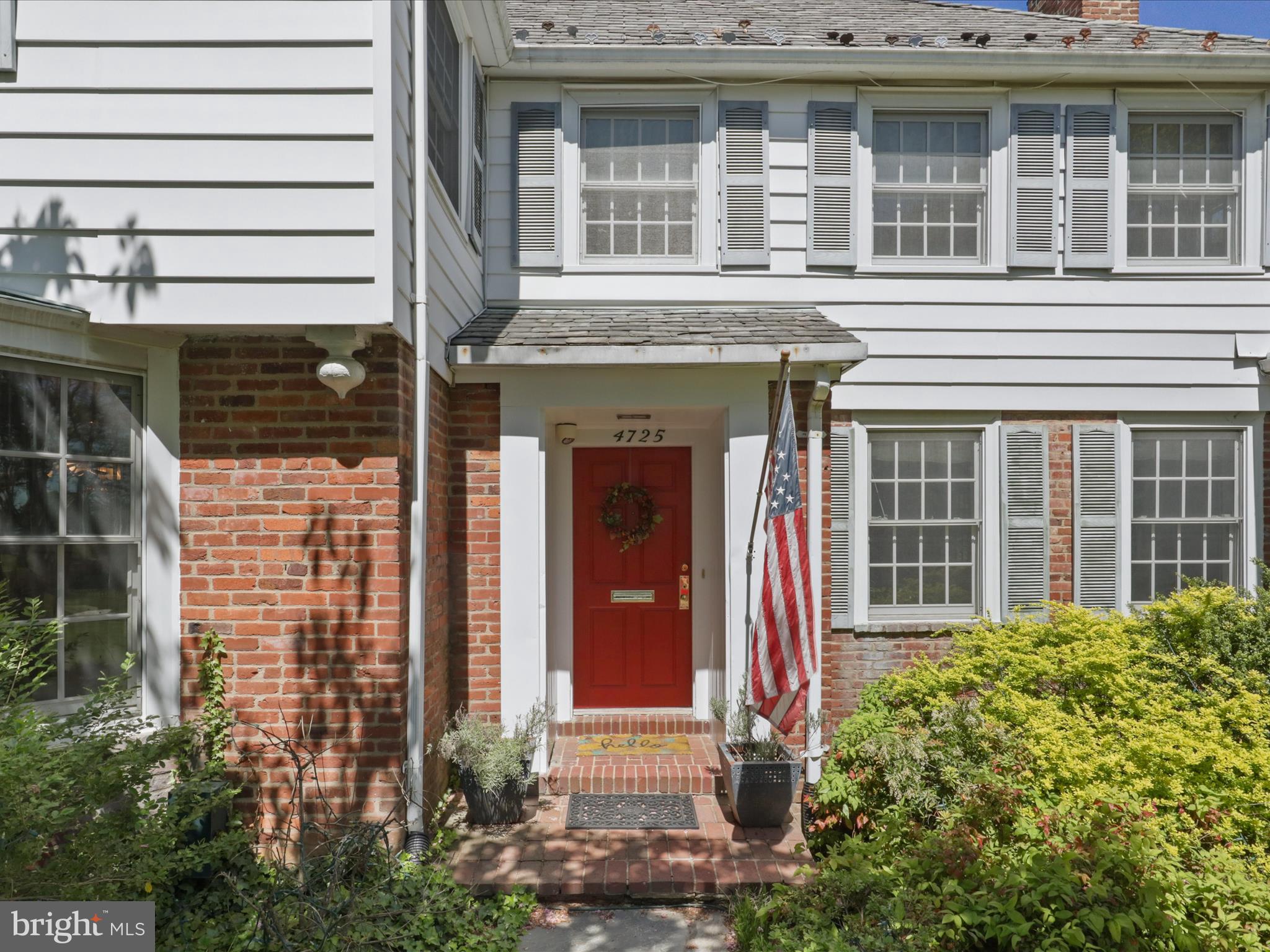 4725 Rock Spring Road Arlington, VA 22207 - Photo 3 of 59 front view of a brick house with a large window