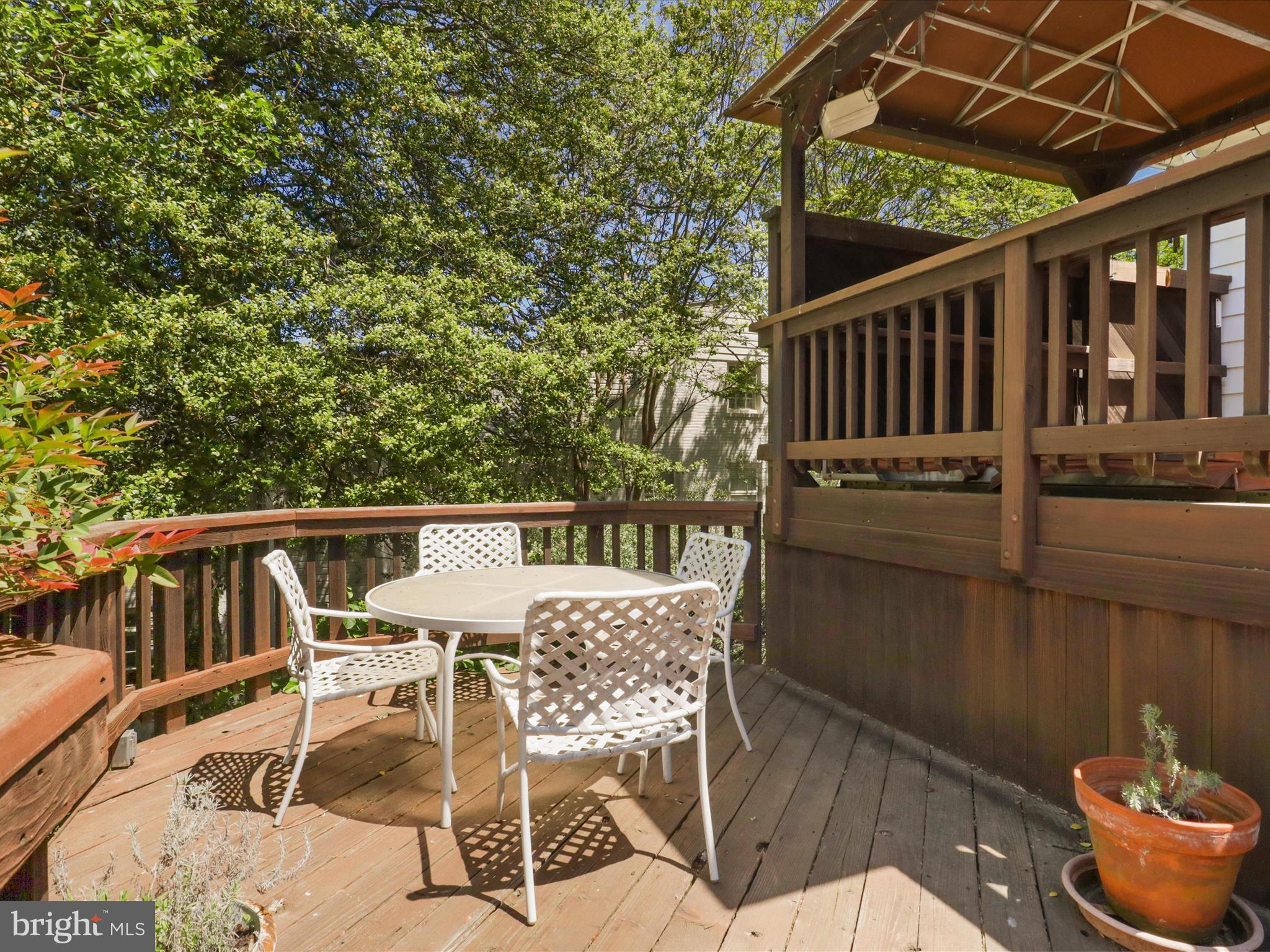 4725 Rock Spring Road Arlington, VA 22207 - Photo 41 of 59 a view of a chair and table in the patio