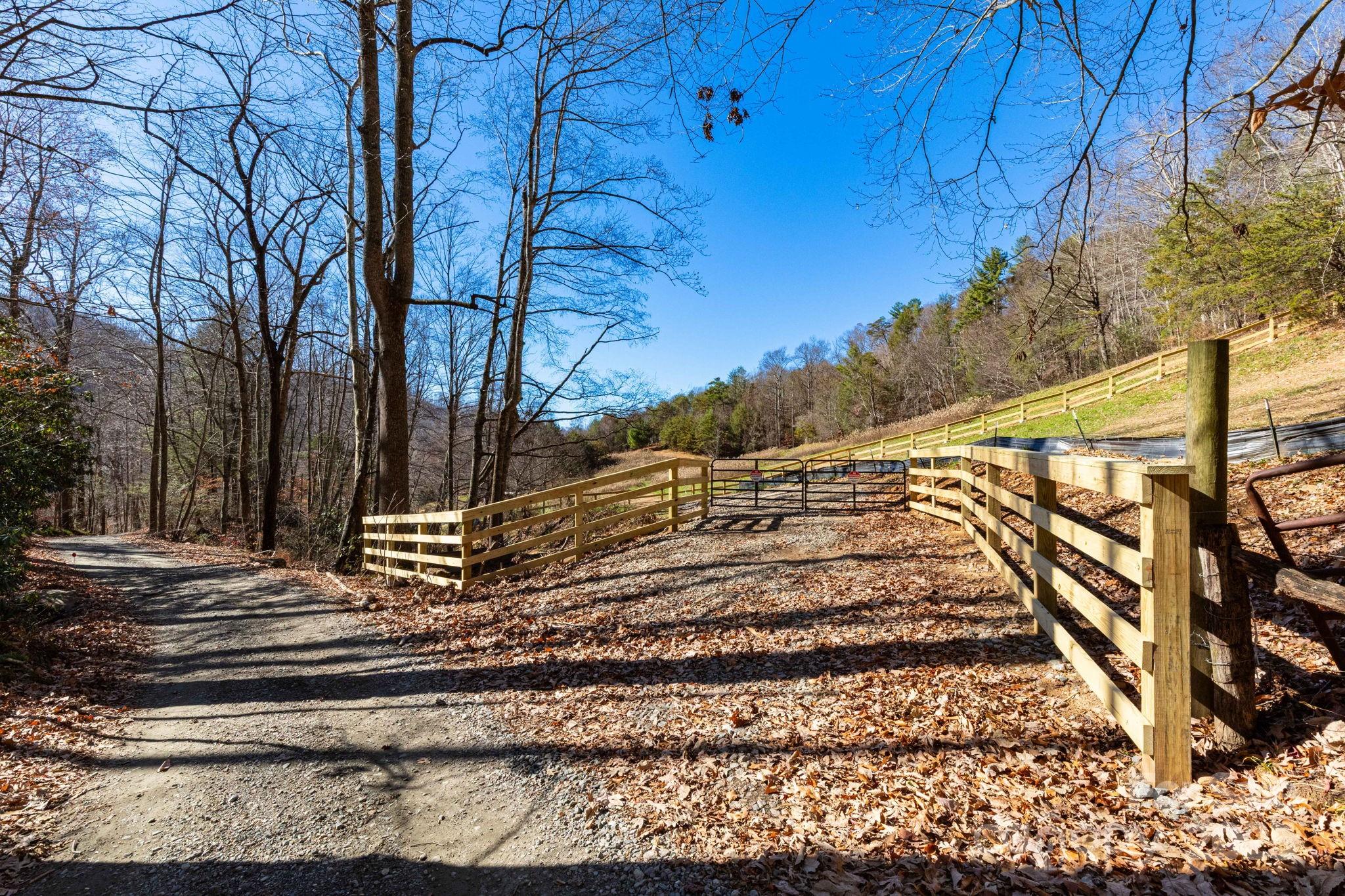 0 Cook Cove Road, Unit 2 Weaverville, NC 28787 - Photo 21 of 38 a view of a yard with wooden fence