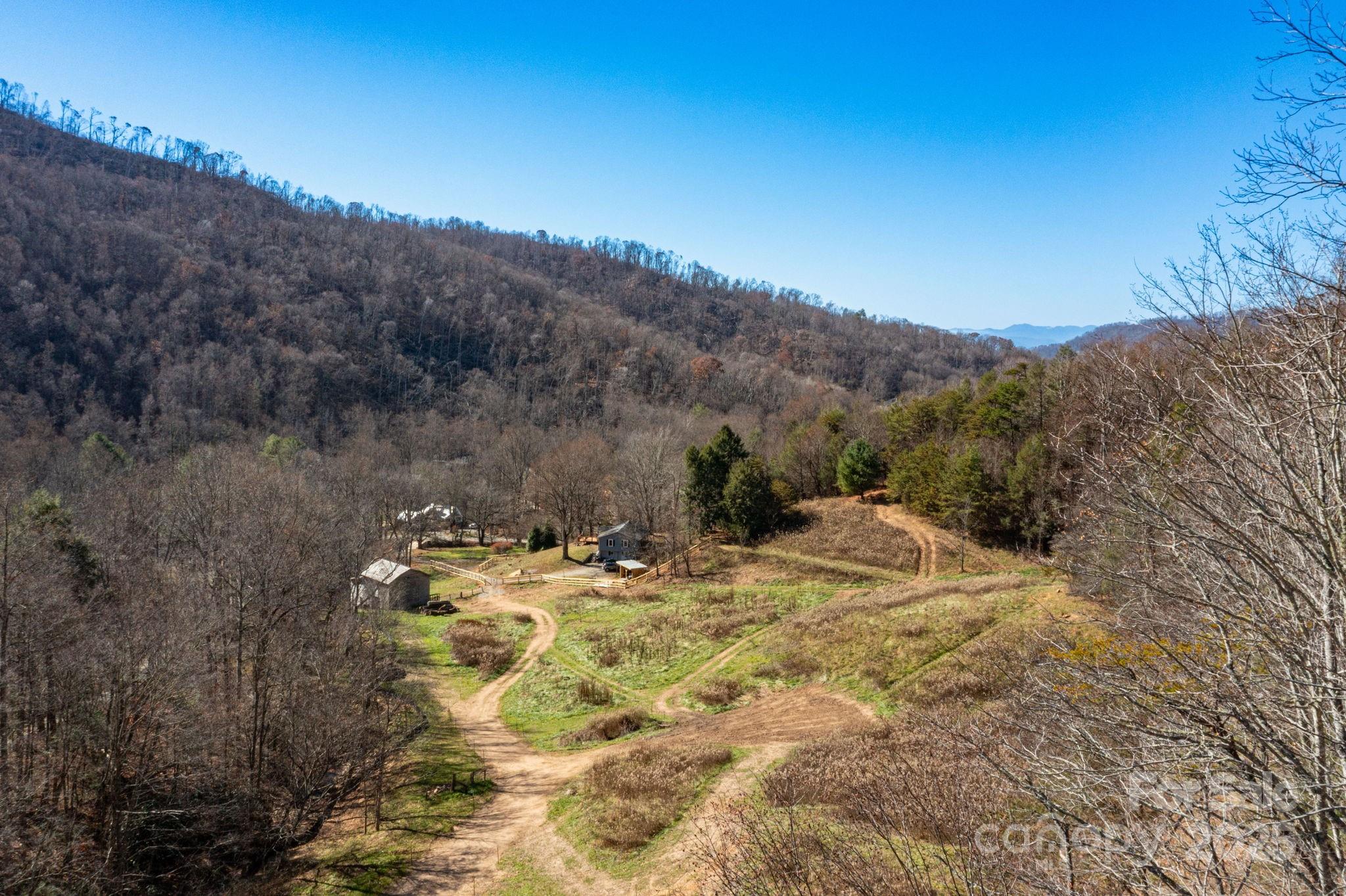 0 Cook Cove Road, Unit 2 Weaverville, NC 28787 - Photo 30 of 38 a view of a dry yard with mountains in the background