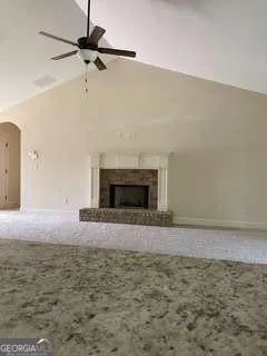 a living room with a fireplace