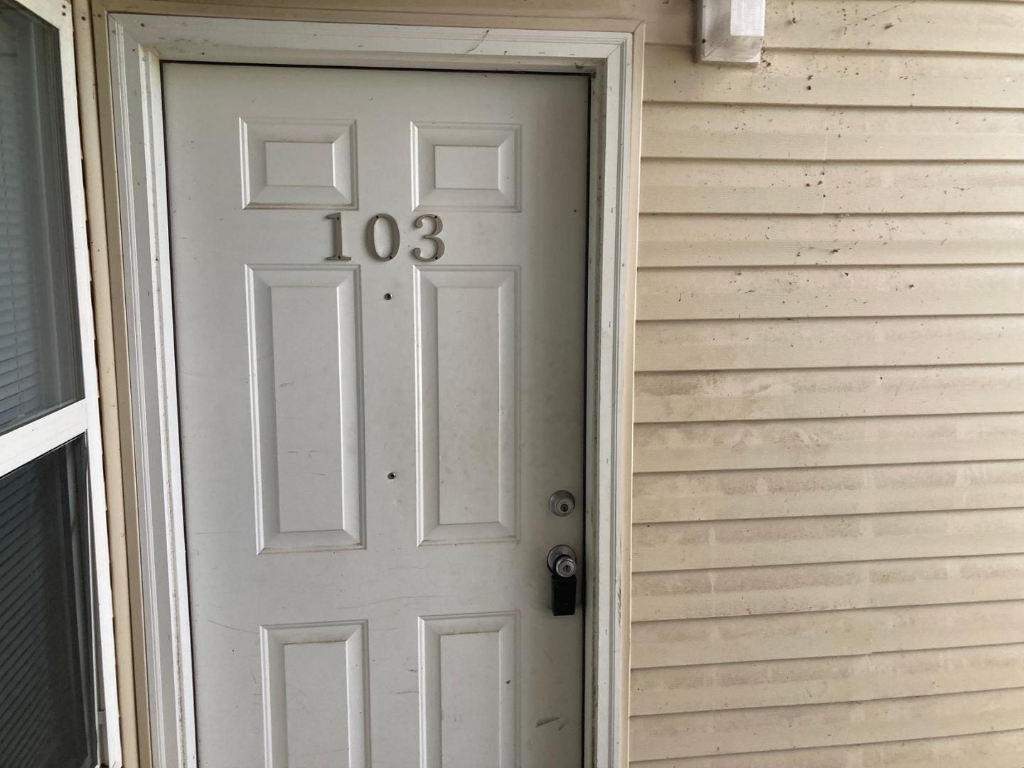 1501 Graduate Lane, Unit 103 Raleigh, NC 27606 - Photo 1 of 9 a view of front door