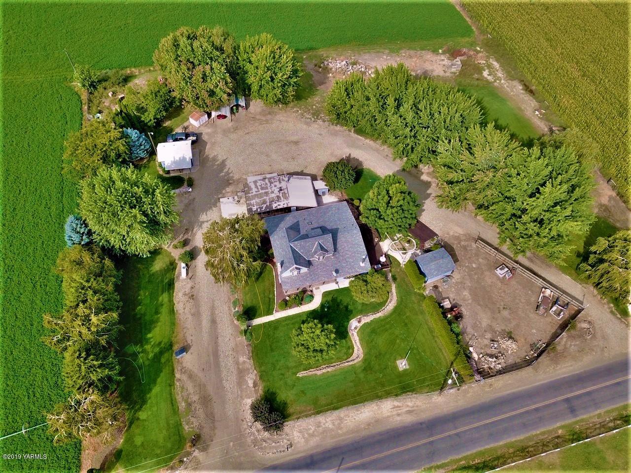 2060 Liberty Road Granger, WA 98932 - Photo 4 of 25 an aerial view of a house a yard and green space