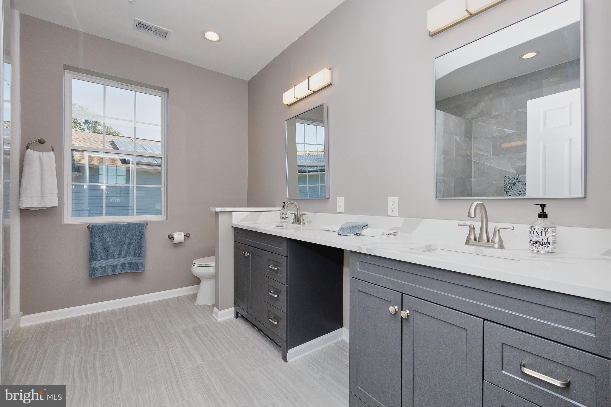 7817 Fairgreen Road Dundalk, MD 21222 - Photo 41 of 57 DUAL SINK GREY/WHITE MASTER BATH