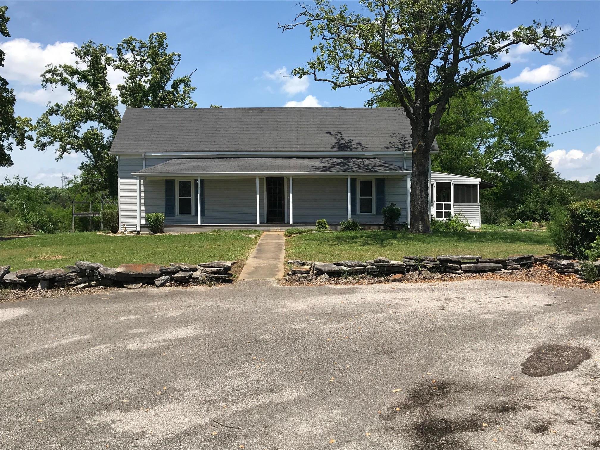 4651 Joe Peay Road Spring Hill, TN 37174 - Photo 1 of 28 front view of a house with a yard