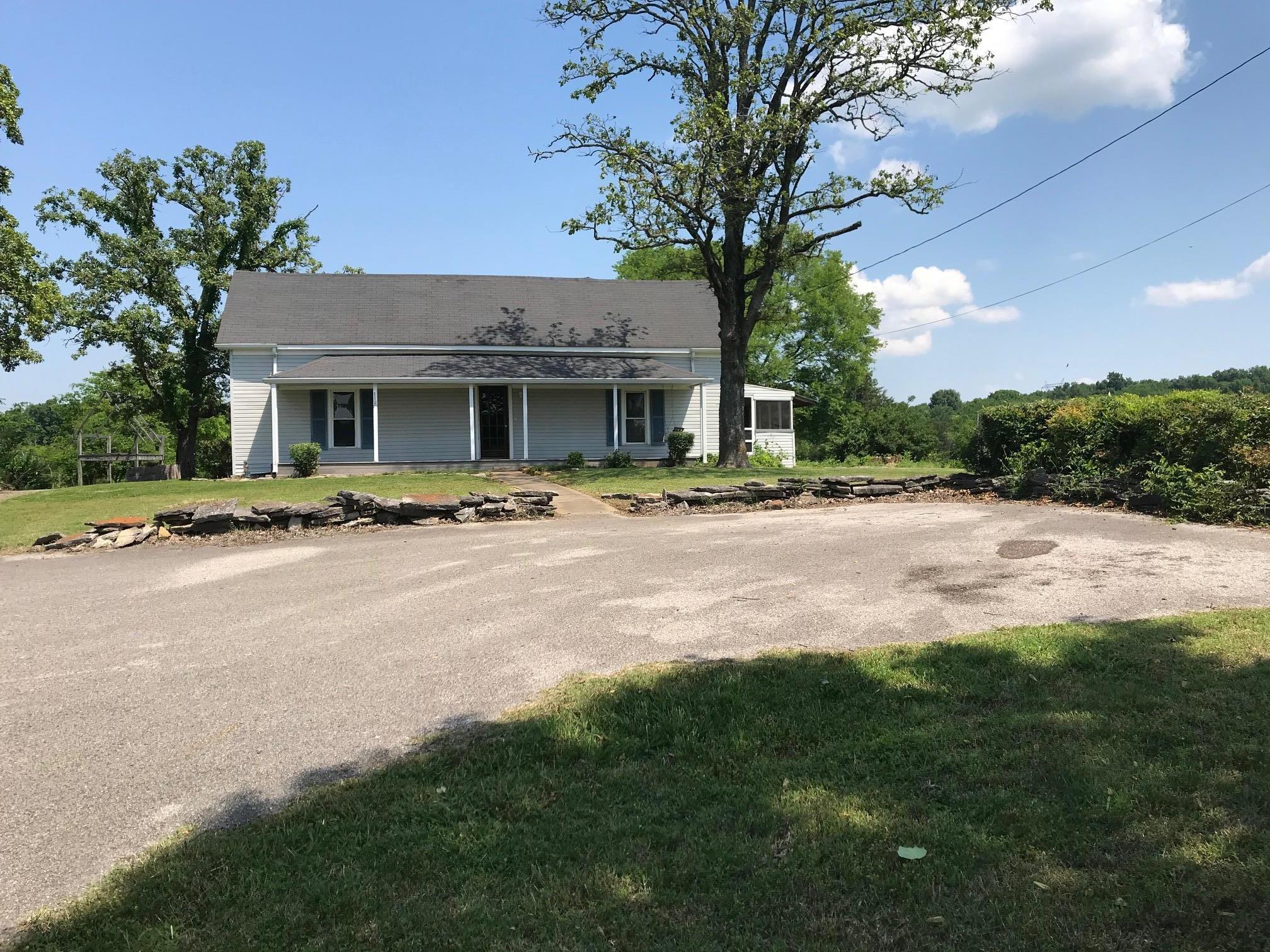 4651 Joe Peay Road Spring Hill, TN 37174 - Photo 2 of 28 a front view of a house with yard and green space