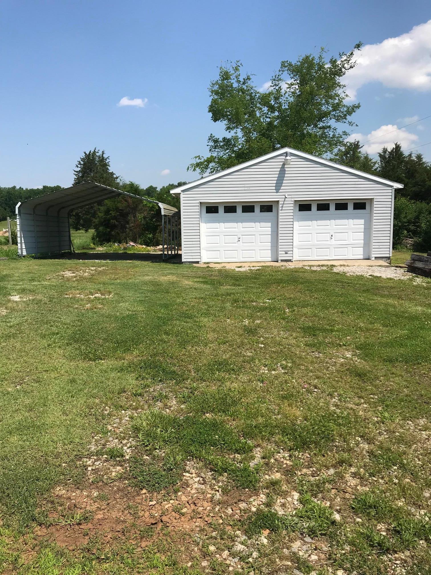 4651 Joe Peay Road Spring Hill, TN 37174 - Photo 27 of 28 a view of a house with a big yard