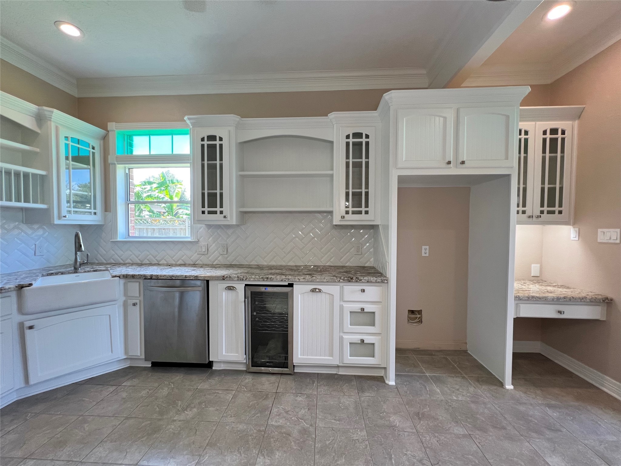 341 Lasso Street Angleton, TX 77515 - Photo 13 of 49 a kitchen with stainless steel appliances granite countertop a stove and a sink