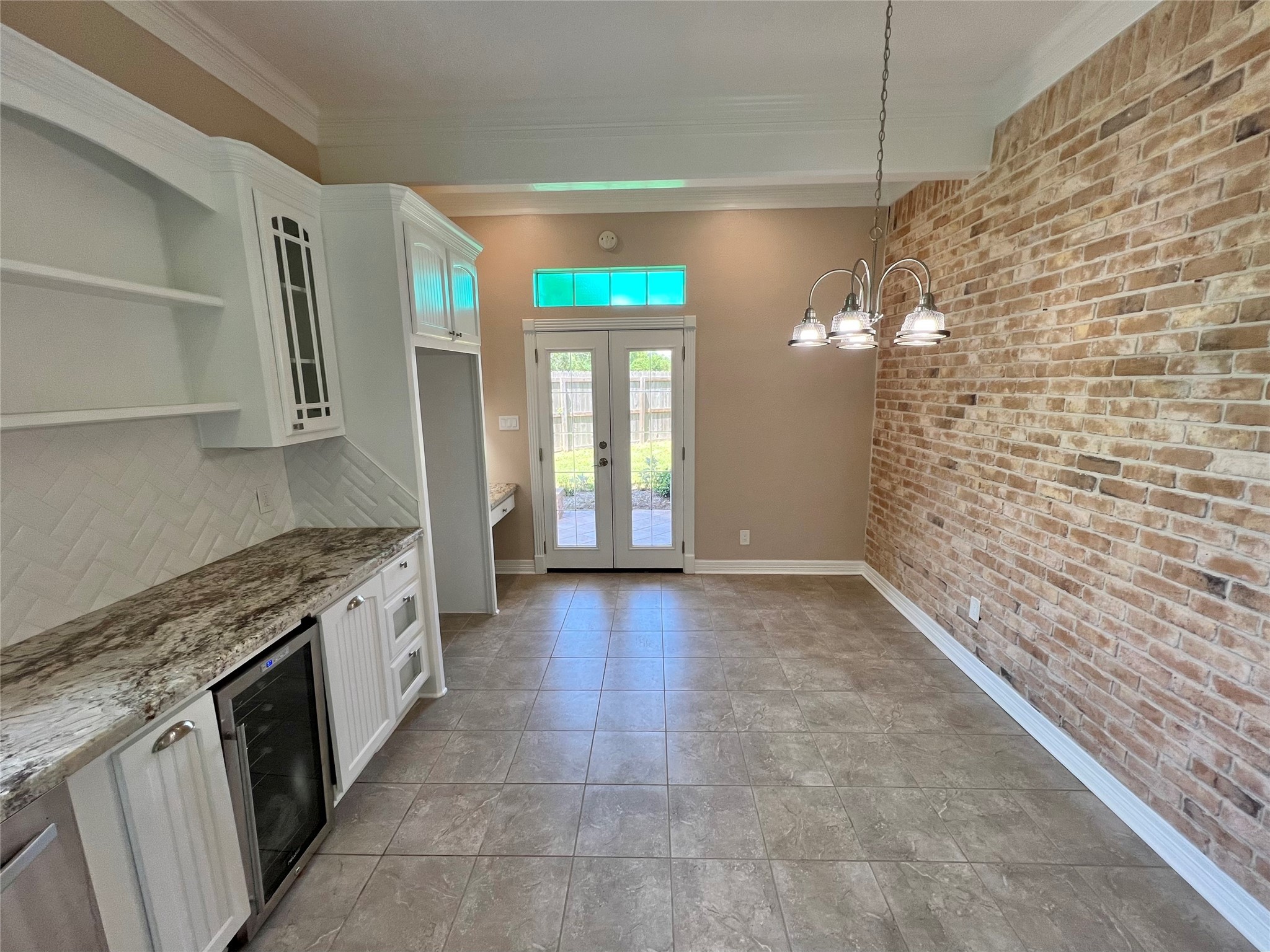 341 Lasso Street Angleton, TX 77515 - Photo 15 of 49 a view of a kitchen with a sink and dishwasher cabinets