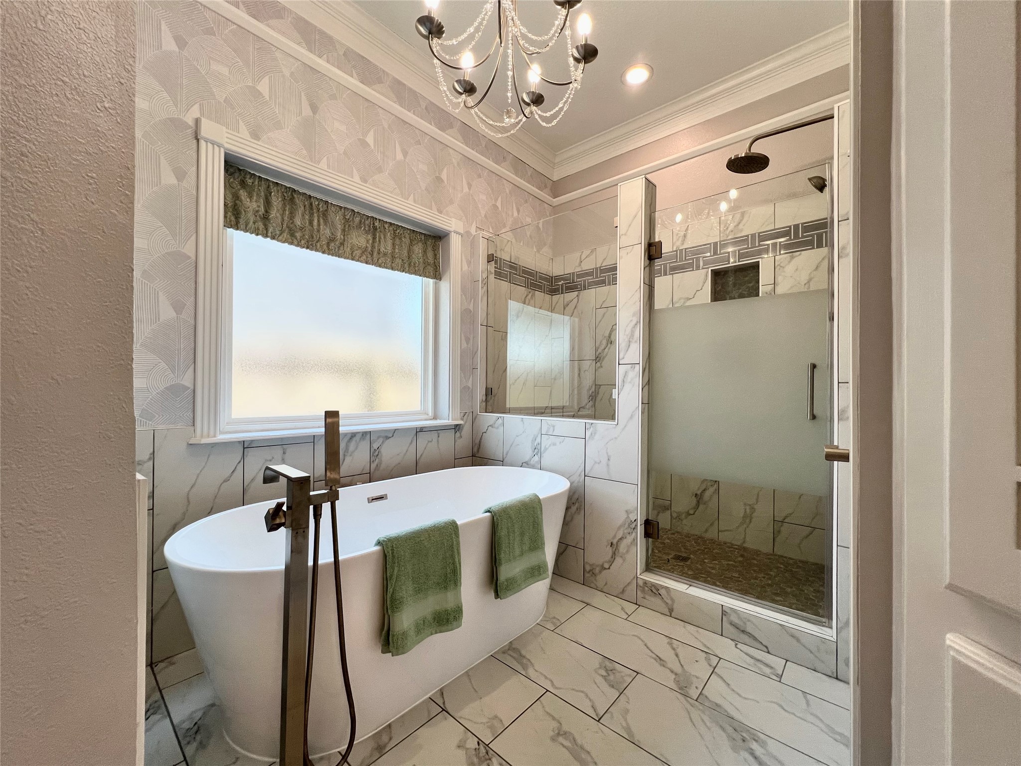 341 Lasso Street Angleton, TX 77515 - Photo 24 of 49 a spacious bathroom with a granite countertop sink a mirror and a shower