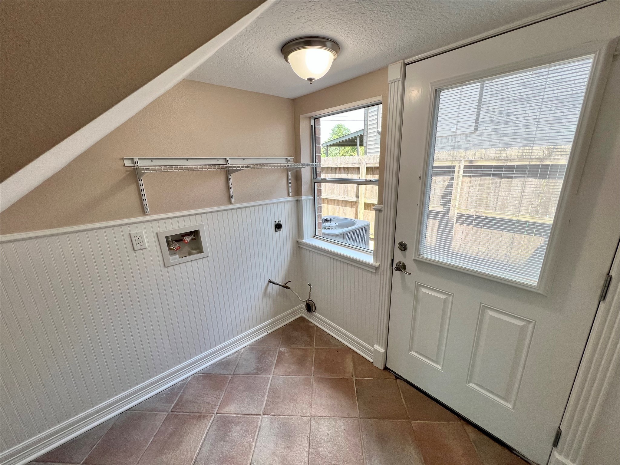 341 Lasso Street Angleton, TX 77515 - Photo 26 of 49 a view of an empty room with a window