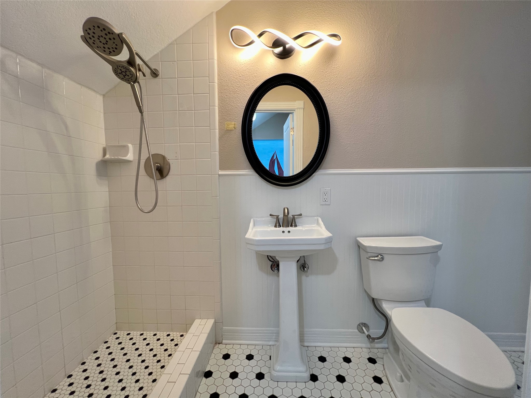 341 Lasso Street Angleton, TX 77515 - Photo 35 of 49 a bathroom with a sink a toilet and a mirror